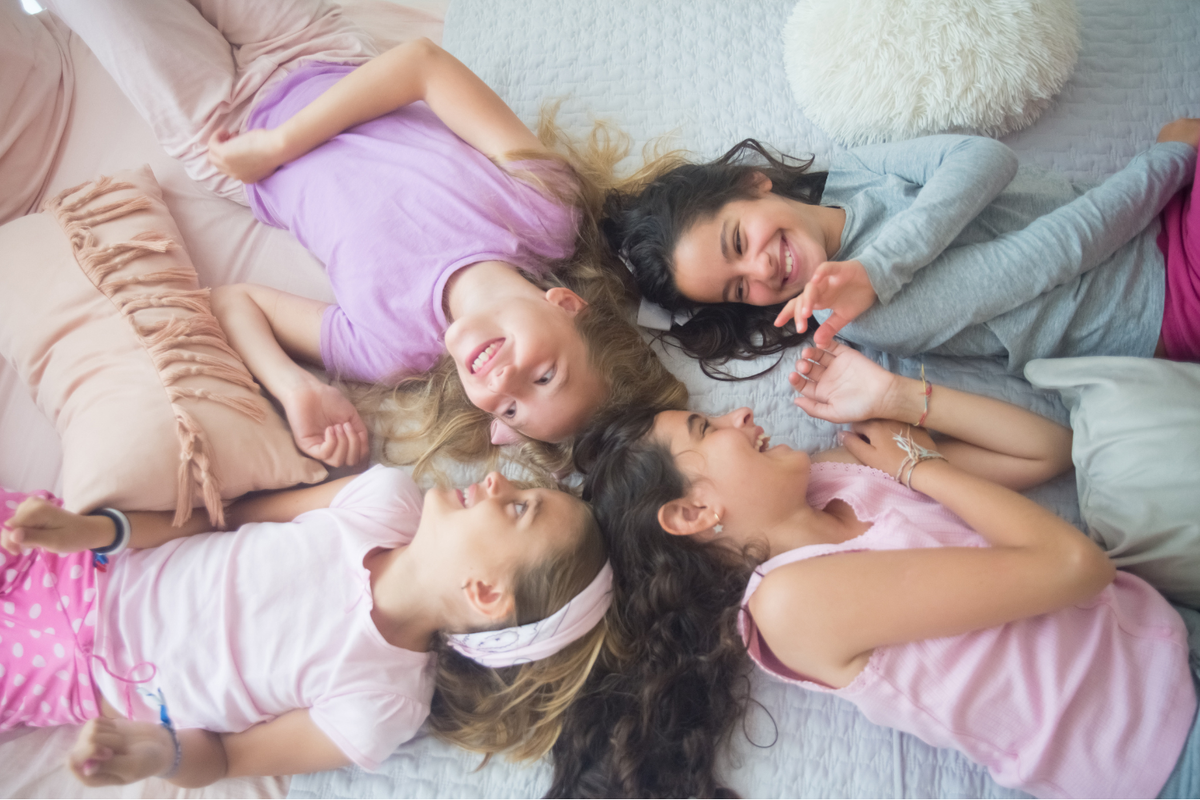 Slumber party setup with teepees and coordinated décor for a kids’ sleepover