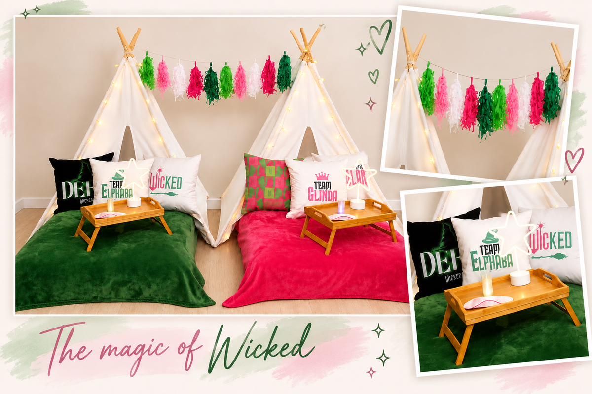 Wicked slumber party theme with green and pink blankets, themed pillows, trays, garland and fairy lights